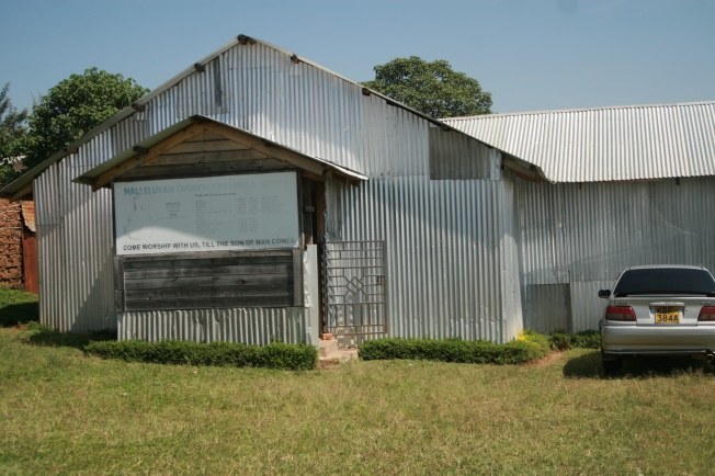 The original Halleluyah Church building — a humble iron-sheet sanctuary where the congregation first gathered in 2022